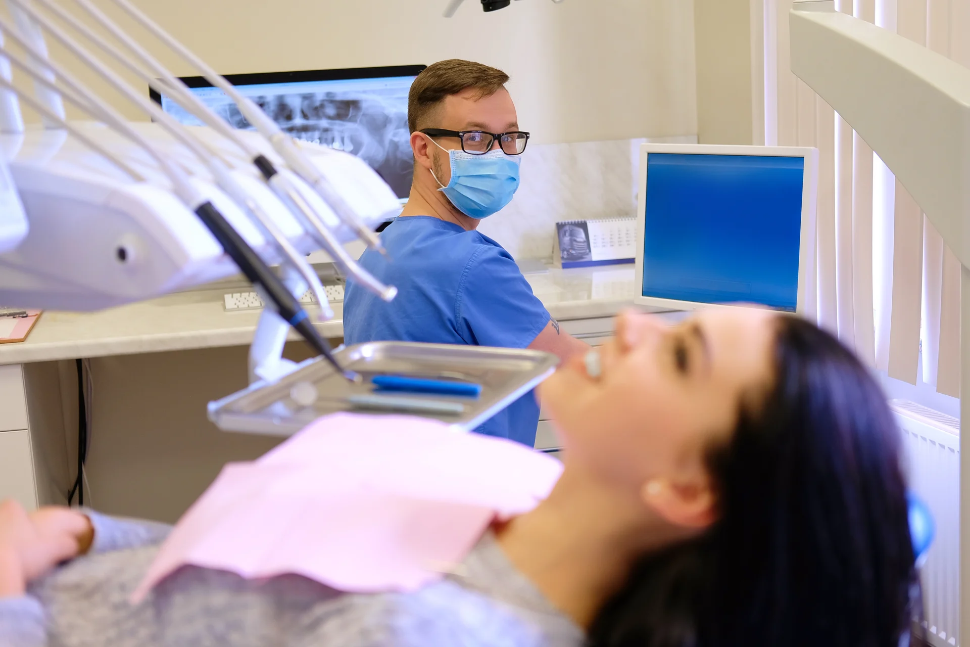 beauty-brunette-female-waiting-while-dentist-working-computer-dentistry-care-vist